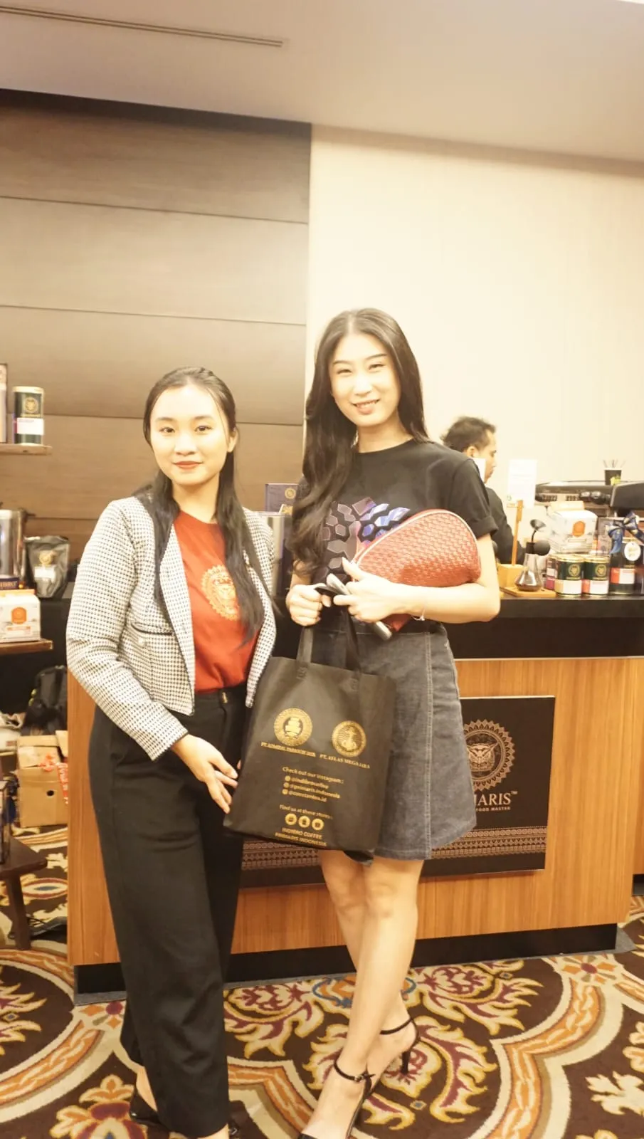 Cindy and a colleague at an event display